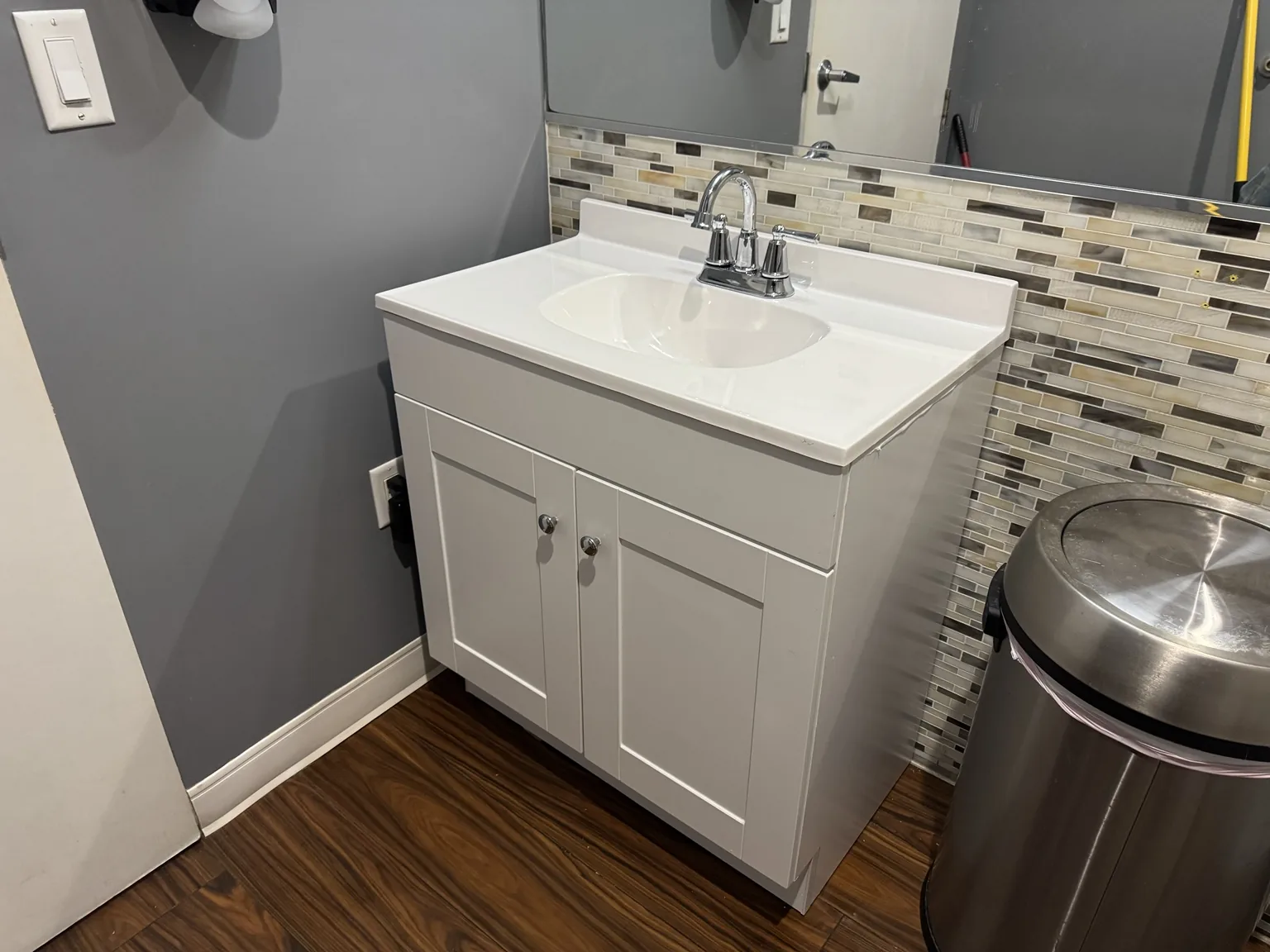 Bathroom vanity and plumbing upgrade completed by PJ's Plumbing